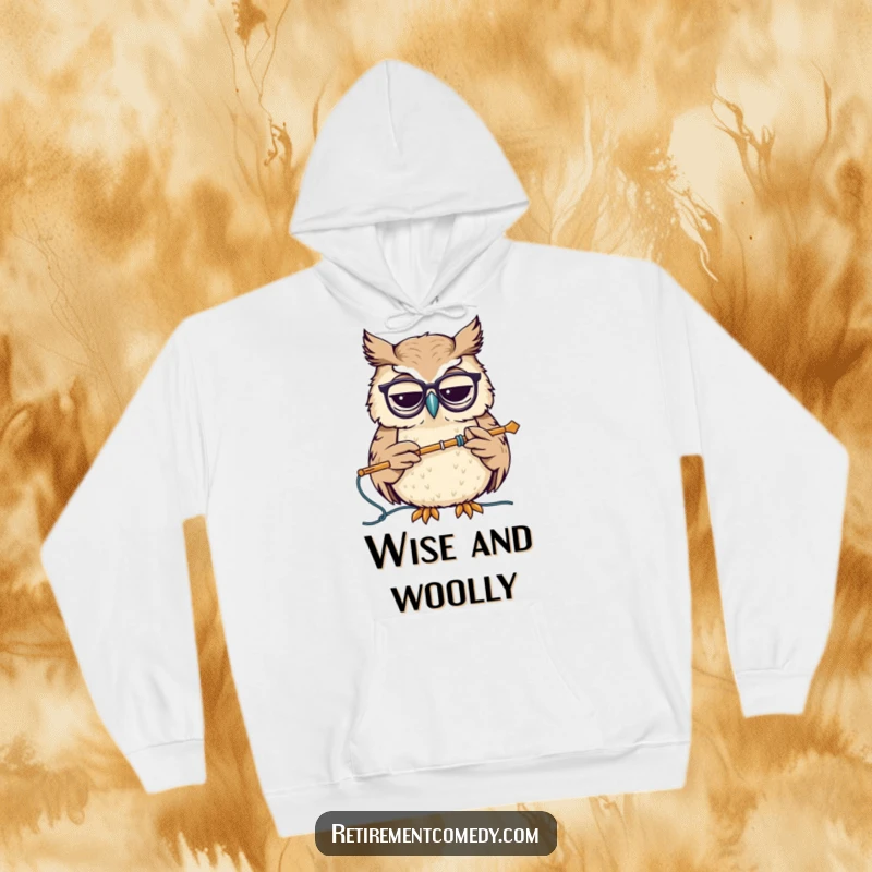 Funny hoodie showcasing a wise owl with spectacles, nodding while holding a knitting needle, presenting a cozy and intellectual humorous design.
