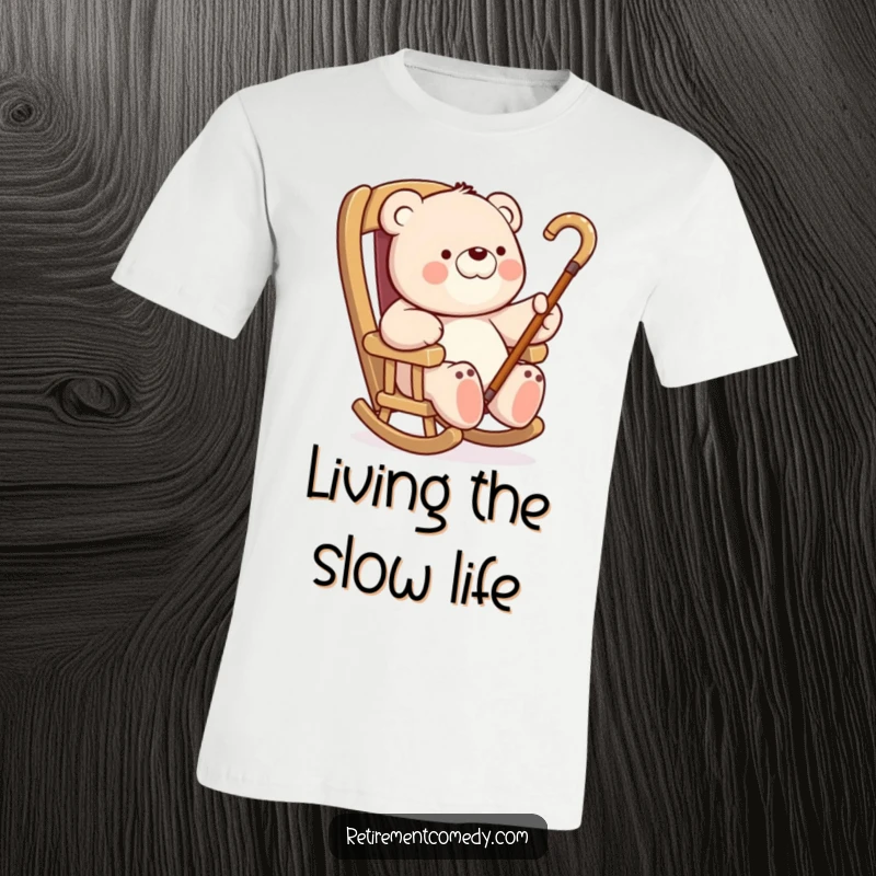 Funny Bear Lazy Day T-Shirt: An illustration of a bear relaxing in a rocking chair, humorously waving a cane, a great funny gift.